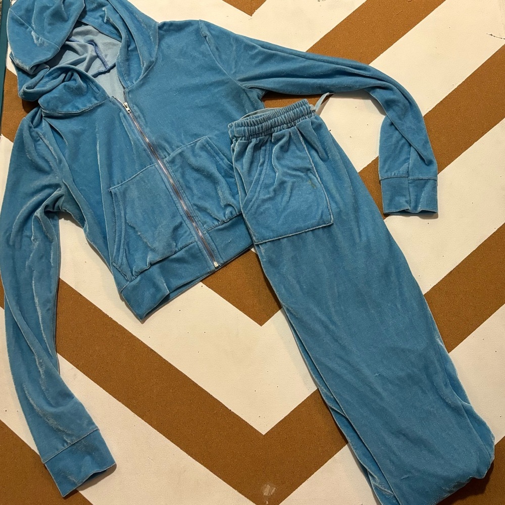 Light blue fuzzy track suit